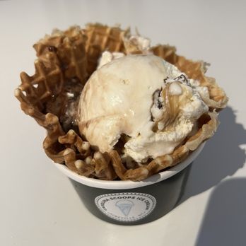 Carolina Scoops Ice Cream - Coconut ice cream, chocolate fudge, caramel and macadamia nuts in a waffle cup. - Ice Cream & Frozen Yogurt Near Me - Pineville, North Carolina