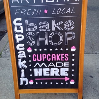 Cupcakin' Bake Shop - Cupcakin' signage on the sidewalk. - Bakeries Near Me - Berkeley, California
