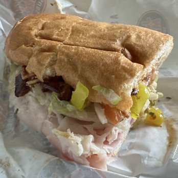 Jersey Mike's Subs - Half of a Club sub--turkey, ham, provolone, bacon and Mikes Way. June '26 - Sandwiches Near Me - South Boston, Virginia