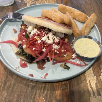 Hola Arepa - Black Bean & Queso Fresco Arepa Yuca Fries - Latin American Near Me - Minneapolis, Minnesota Hola Arepa - Black Bean & Queso Fresco Arepa Yuca Fries - Latin American Near Me - Minneapolis, Minnesota