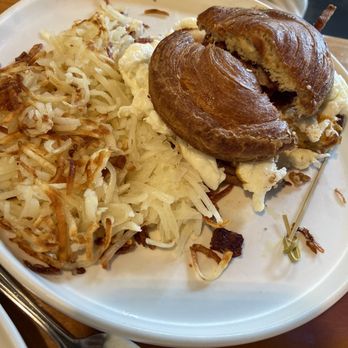 Twisted Egg - croissant breakfast sandwich with hashbrownz - Breakfast & Brunch Near Me - Aurora, Colorado
