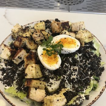 Unconventional Diner - Caesar Salad with chicken and "squid ink" croutons - Breakfast & Brunch Near Me - Washington, DC, District of Columbia Unconventional Diner - Caesar Salad with chicken and "squid ink" croutons - Breakfast & Brunch Near Me - Washington, DC, District of Columbia