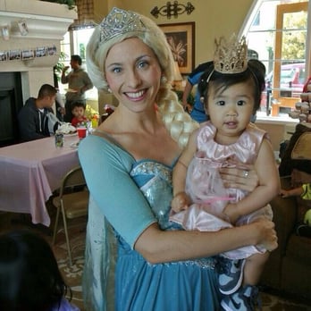 Magic Princess - Kris as Queen Elsa with the birthday girl for her first birthday. - Party Characters Near Me
