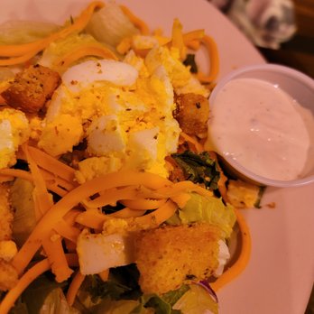 Texas Roadhouse - a plate of salad with dressing - Barbeque Near Me - Shakopee, Minnesota Texas Roadhouse - a plate of salad with dressing - Barbeque Near Me - Shakopee, Minnesota