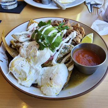 Madi - Chilequilles with carnitas and an extra poached egg - Breakfast & Brunch Near Me - San Diego, California Madi - Chilequilles with carnitas and an extra poached egg - Breakfast & Brunch Near Me - San Diego, California