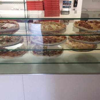 Sal's Pizza - Pizza by the slice! It's 1/4 of this huge 19" pizza! There are 14 different types of pizza available right now!! - Pizza Near Me - Hooksett, New Hampshire
