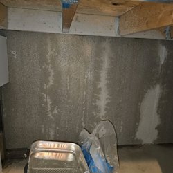 Huron Inspections - Water intrusion (running down foundation). Determined to be neighbors refrigerator line leaking (condo).