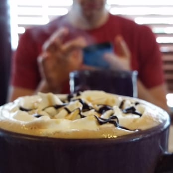 Javaman Coffee - Turtle latte with whipped cream drizzled with carmel and chocolate. - Creperies Near Me - Humble, Texas Javaman Coffee - Turtle latte with whipped cream drizzled with carmel and chocolate. - Creperies Near Me - Humble, Texas