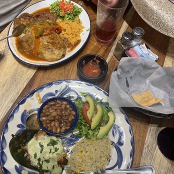 El Chaparral-Boerne - Regular Chile Relleno Plate and the blue plate is Christina's Relleno. - Mexican Near Me - Boerne, Texas El Chaparral-Boerne - Regular Chile Relleno Plate and the blue plate is Christina's Relleno. - Mexican Near Me - Boerne, Texas