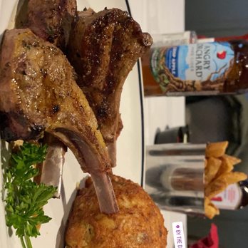 By The Docks Restaurant - Lamb chops and crab cake with fries and Caesar salad - Seafood Near Me - Middle River, Maryland By The Docks Restaurant - Lamb chops and crab cake with fries and Caesar salad - Seafood Near Me - Middle River, Maryland