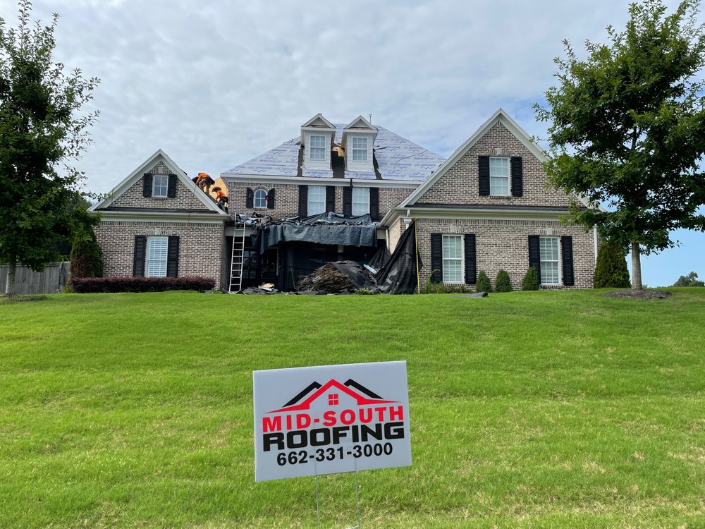 Slide of Ultimate Roofing