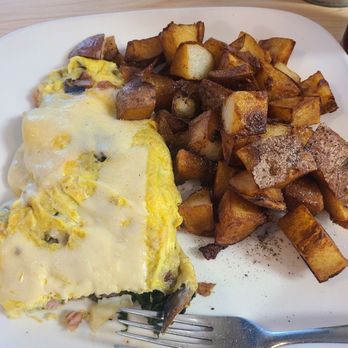 The Purple Onion Cafe - Build your own scramble with Swiss, spinach, ham & biscuit (next pic). - Cafes Near Me - Shallotte, North Carolina The Purple Onion Cafe - Build your own scramble with Swiss, spinach, ham & biscuit (next pic). - Cafes Near Me - Shallotte, North Carolina
