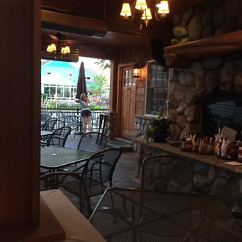 VI Grill - The best patio anywhere! Oh, and the most awesome bartender Melissa getting it ready. - Burgers Near Me - Suttons Bay, Michigan VI Grill - The best patio anywhere! Oh, and the most awesome bartender Melissa getting it ready. - Burgers Near Me - Suttons Bay, Michigan