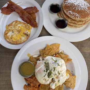 Hash Kitchen - Chilaquiles with eggs + Pancakes with side of eggs and Applewood Smoked Bacon - Breakfast & Brunch Near Me - Chandler, Arizona Hash Kitchen - Chilaquiles with eggs + Pancakes with side of eggs and Applewood Smoked Bacon - Breakfast & Brunch Near Me - Chandler, Arizona