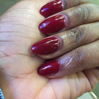 JT Nails & Spa - You can see the divet in my middle finger nail. Cuticle Line uneven. I filed them down on the sides to make them look like something. - Nail Salons Near Me - Kissimmee, Florida