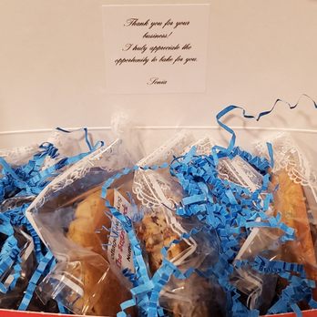 The Sugar Shack - a box of donuts with blue ribbons - Desserts Near Me The Sugar Shack - a box of donuts with blue ribbons - Desserts Near Me