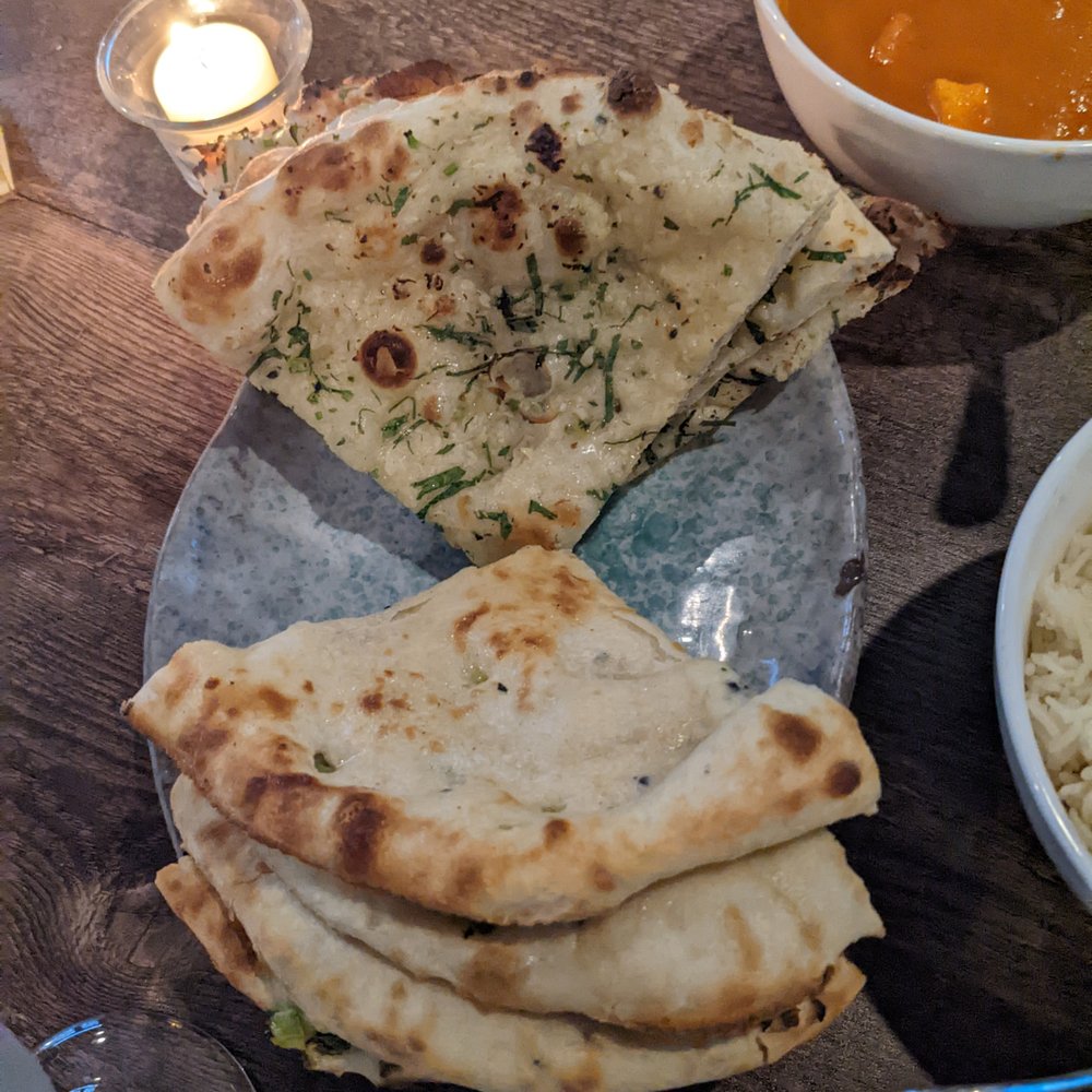 Moon Indian Cuisine - Garlic naan (above) and bullet naan (below) - Indian Near Me - Alpharetta, Georgia