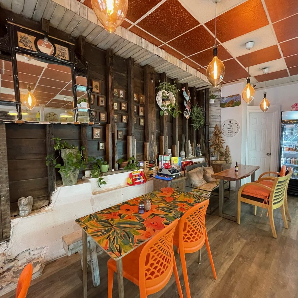 Polka Dot - a dining room with orange chairs - Polish Near Me - Brooklyn, New York