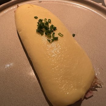 The Lambs Club - Pillowy omelette. This one had Gruyère and ham. - New American Near Me - New York, New York The Lambs Club - Pillowy omelette. This one had Gruyère and ham. - New American Near Me - New York, New York