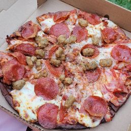 Cauliflower pizza. Which one? I don't remember but it has all of the meats on it. Cauliflower pizza. Which one? I don't remember but it has all of the meats on it.