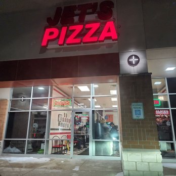 Jet's Pizza - the front of a restaurant at night - Pizza Near Me - Grandville, Michigan Jet's Pizza - the front of a restaurant at night - Pizza Near Me - Grandville, Michigan