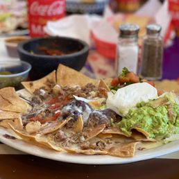 These nachos supreme with picadillo beef will take you to another realm. SO good. YUM! These nachos supreme with picadillo beef will take you to another realm. SO good. YUM!