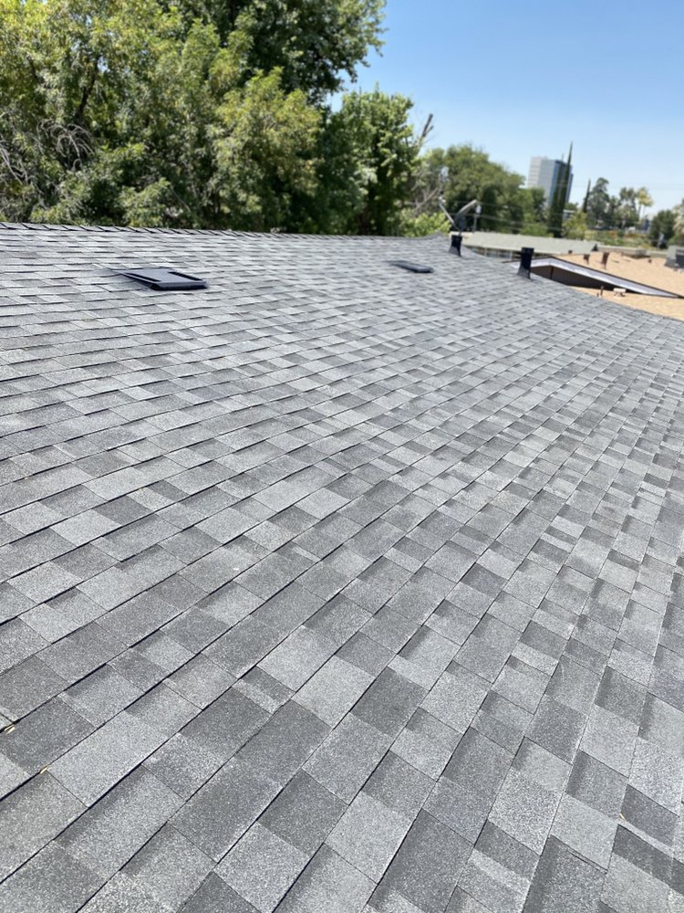 Slide of H&M ROOFING