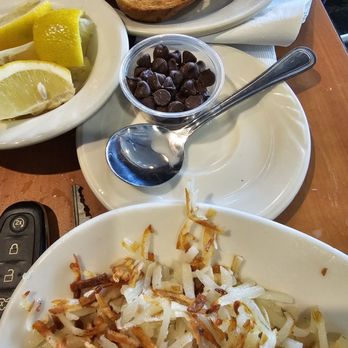 Lume's Pancake House - Hash browns, jelly and raisin toast. - Pancakes Near Me - Chicago, Illinois Lume's Pancake House - Hash browns, jelly and raisin toast. - Pancakes Near Me - Chicago, Illinois