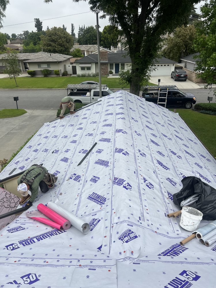Slide of Heritage Roofing Solutions
