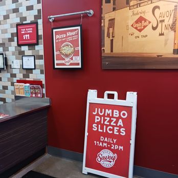 Red's Savoy Pizza - a sign in a restaurant - Pizza Near Me - Saint Louis Park, Minnesota