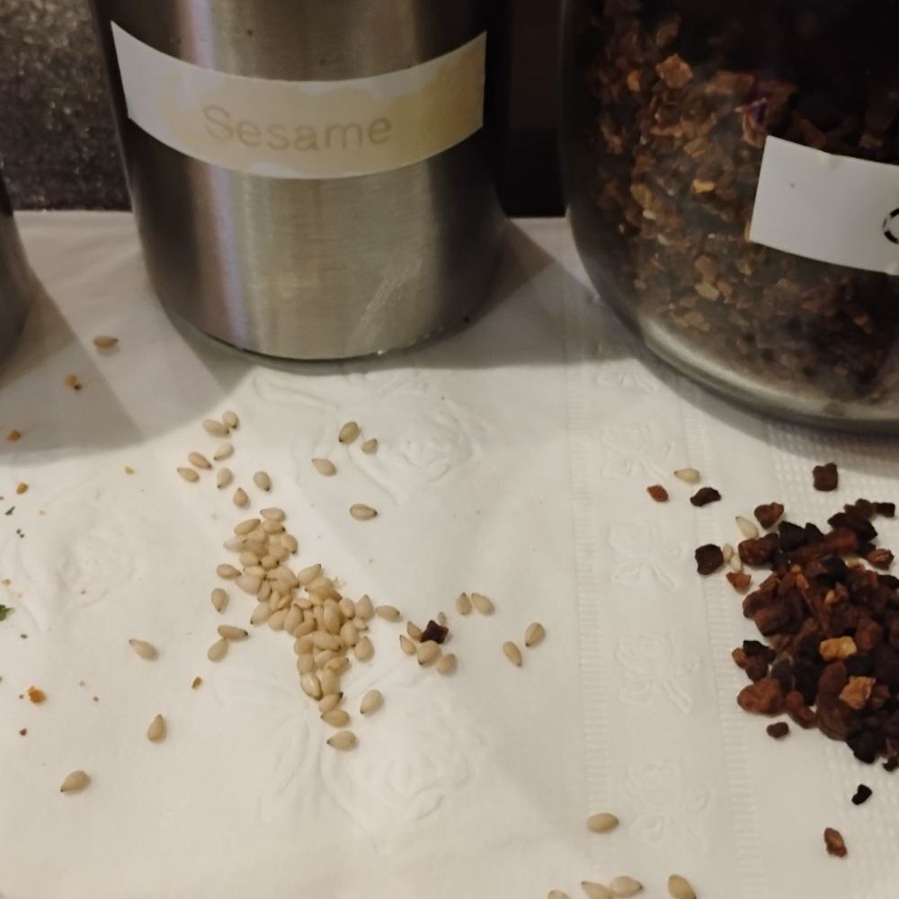 Futumake (rice seasoning), sesame seeds, and black garlic on the tables. All great. Futumake (rice seasoning), sesame seeds, and black garlic on the tables. All great.