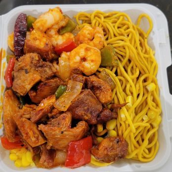 Kelly's Cajun Grill - a take out container of shrimp and noodles - Cajun/Creole Near Me - East Rutherford, New Jersey Kelly's Cajun Grill - a take out container of shrimp and noodles - Cajun/Creole Near Me - East Rutherford, New Jersey