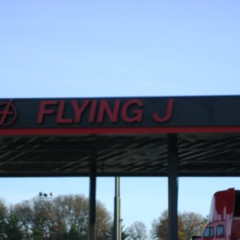 Flying J Travel Center - a red truck at a gas station - Convenience Stores Near Me - Black River Falls, Wisconsin Flying J Travel Center - a red truck at a gas station - Convenience Stores Near Me - Black River Falls, Wisconsin