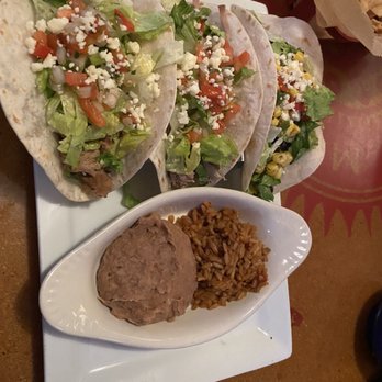 Red Mesa Grill - Three softshell tacos One was chicken another was pork and and one was beans and rice. And there's some beans and a little bit of rice - Latin American Near Me - Boyne City, Michigan Red Mesa Grill - Three softshell tacos One was chicken another was pork and and one was beans and rice. And there's some beans and a little bit of rice - Latin American Near Me - Boyne City, Michigan