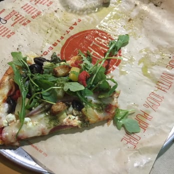 Blaze Pizza - Roasted garlic, pineapples, olives, Red peppers, arugula, red onion, goat cheese & mozzarella cheese, pesto, & artichoke!!! - Pizza Near Me - Riverside, California