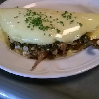 Au Cheval - trumpet mushroom, kale and morel jack cheese omelet - Bars Near Me - Chicago, Illinois Au Cheval - trumpet mushroom, kale and morel jack cheese omelet - Bars Near Me - Chicago, Illinois