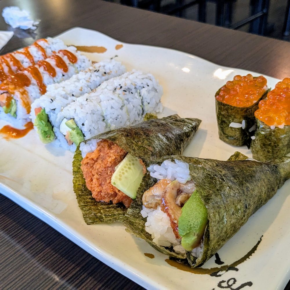Threesome Roll, Philly Roll, Spicy Tuna Handroll, Unagi Handroll, and Ikura Nigiri
