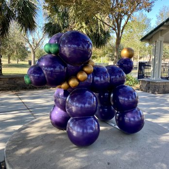 Lafreniere Park - Mardi Gras bead dog at entrance of dog park - Parks Near Me - Metairie, Louisiana