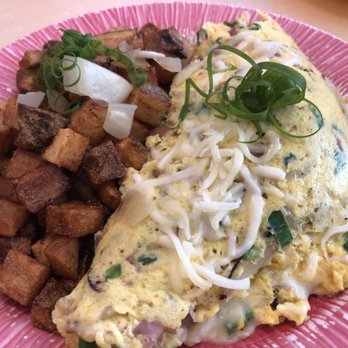 My Cafe - Kama'aina Scramble ($15.95): bring on the meats with bacon, ham, Portuguese sausage, spam, sprouts, onions, and cheese to boot! - Breakfast & Brunch Near Me - Kapolei, Hawaii My Cafe - Kama'aina Scramble ($15.95): bring on the meats with bacon, ham, Portuguese sausage, spam, sprouts, onions, and cheese to boot! - Breakfast & Brunch Near Me - Kapolei, Hawaii