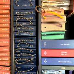 Seymour's Fashions Custom Tailors - A few of our swatch books