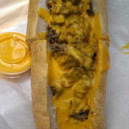 Top view with steak and cheese wiz. Top view with steak and cheese wiz.