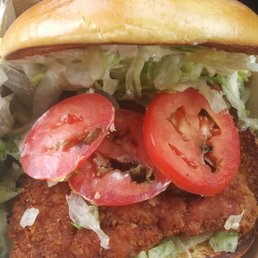 Rotten tomatoes on a crispy chicken deluxe.