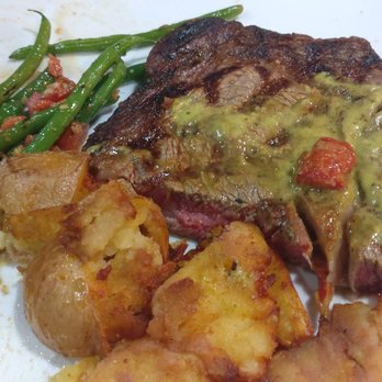 Texas Bistro - Ribeye 12 oz. Potatoes and green beans great. Meat chewy, not worth $28. - New American Near Me - New Braunfels, Texas Texas Bistro - Ribeye 12 oz. Potatoes and green beans great. Meat chewy, not worth $28. - New American Near Me - New Braunfels, Texas