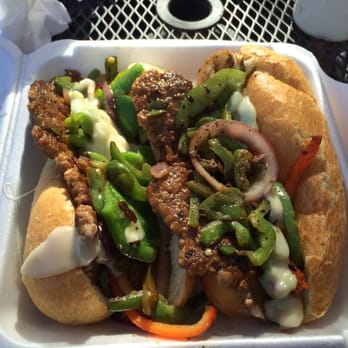 Vito's - Italian Sausage Sandwich - topped with grilled peppers, onions and melted provolone. - Italian Near Me - Bountiful, Utah