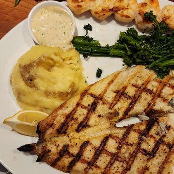 Seasons 52 - Rainbow trout, mashed potatoes and broccolini. - New American Near Me - Chestnut Hill, Massachusetts Seasons 52 - Rainbow trout, mashed potatoes and broccolini. - New American Near Me - Chestnut Hill, Massachusetts