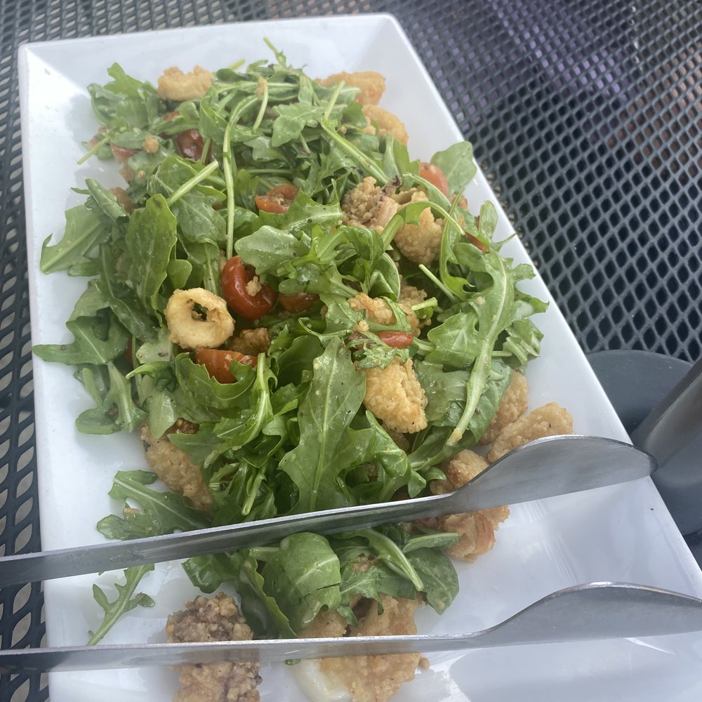 Fiammé - Calamari appetizer comes as a salad. - Pizza Near Me - Naperville, Illinois Fiammé - Calamari appetizer comes as a salad. - Pizza Near Me - Naperville, Illinois