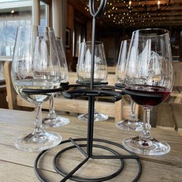 three glasses of wine on a table