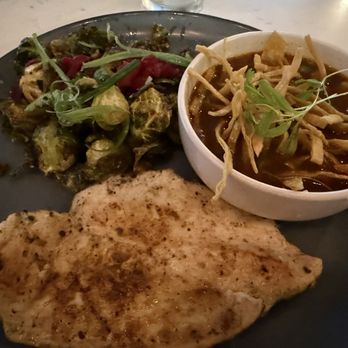 Dish Society - Farm to table grilled chicken with chicken tortilla soup and brussel sprouts - Breakfast & Brunch Near Me - Houston, Texas Dish Society - Farm to table grilled chicken with chicken tortilla soup and brussel sprouts - Breakfast & Brunch Near Me - Houston, Texas