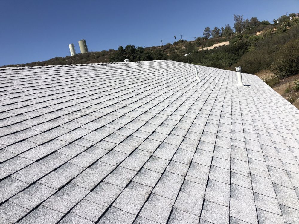 Slide of Escamilla’s Roofing and Rain Gutters