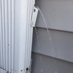 Budget Exteriors - discovered downspouts not reeattached correctly allowing water to leak by foundation